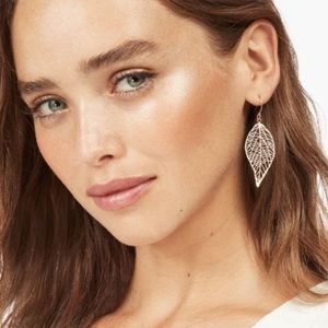 Golden feather drop earrings. New